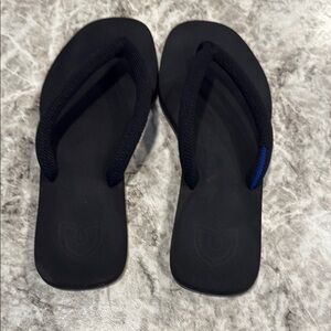 Rothy's Black Flip Flop Sandals with Subtle Blue Accent